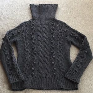Cozy Milly cable knit turtleneck sweater